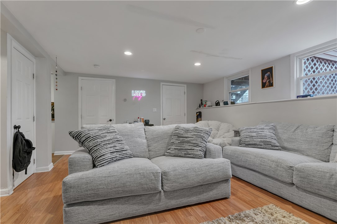 204 Talcott Street Woonsocket, RI 02895 - Photo 18 of 43 Lower Level Living/Dining Area