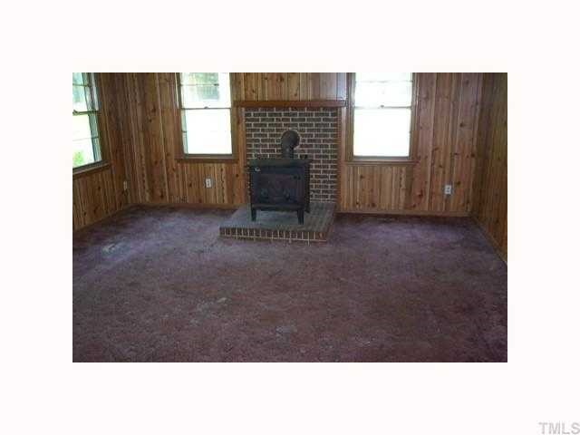 110 Wimberly Road Moncure, NC 27559 - Photo 4 of 11 Wood Stove conveys with property
