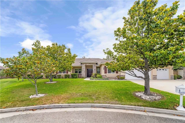 a house with garden in front of it