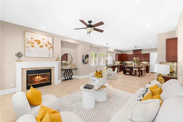 a living room with furniture and fireplace
