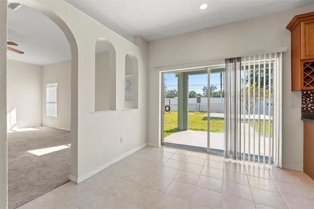 a view of an entryway with a tub