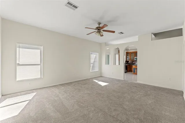 a view of empty room with closet
