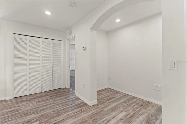 a view of a livingroom with wooden floor