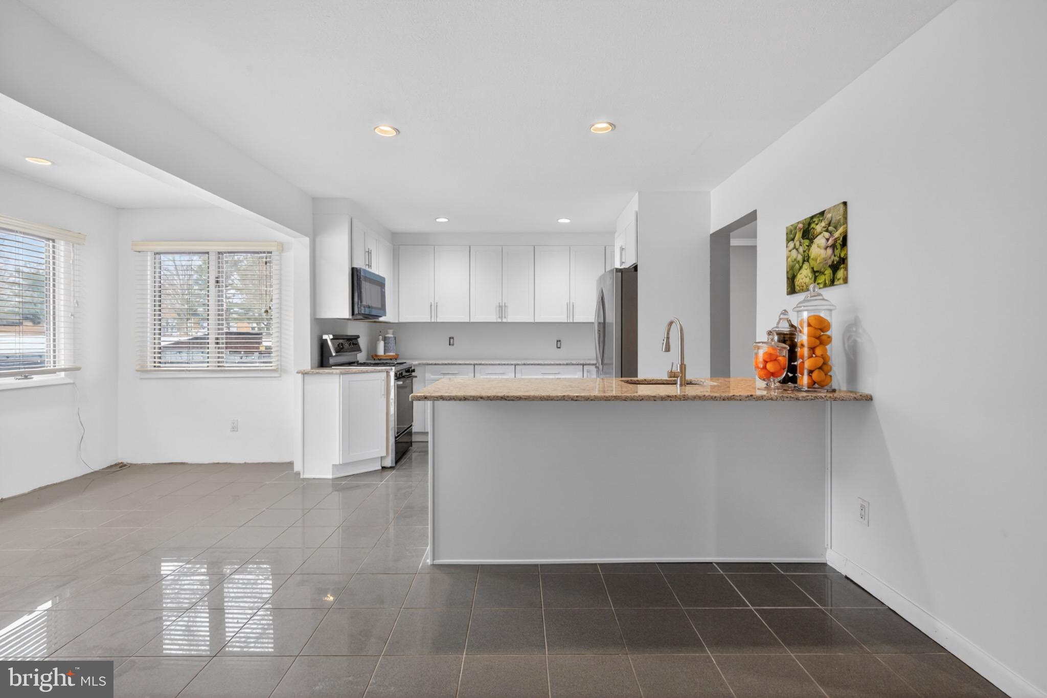 525 Fairfield Road Hightstown, NJ 08520 - Photo 8 of 31 Modern kitchen with sleek finishes.