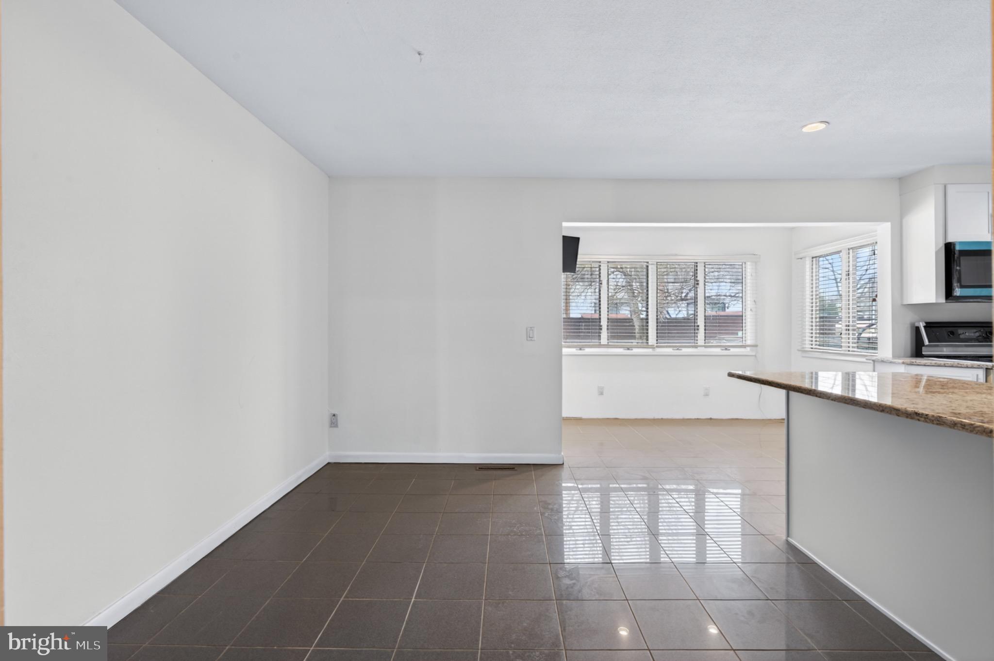525 Fairfield Road Hightstown, NJ 08520 - Photo 9 of 31 Spacious, sunlit open-concept living area.