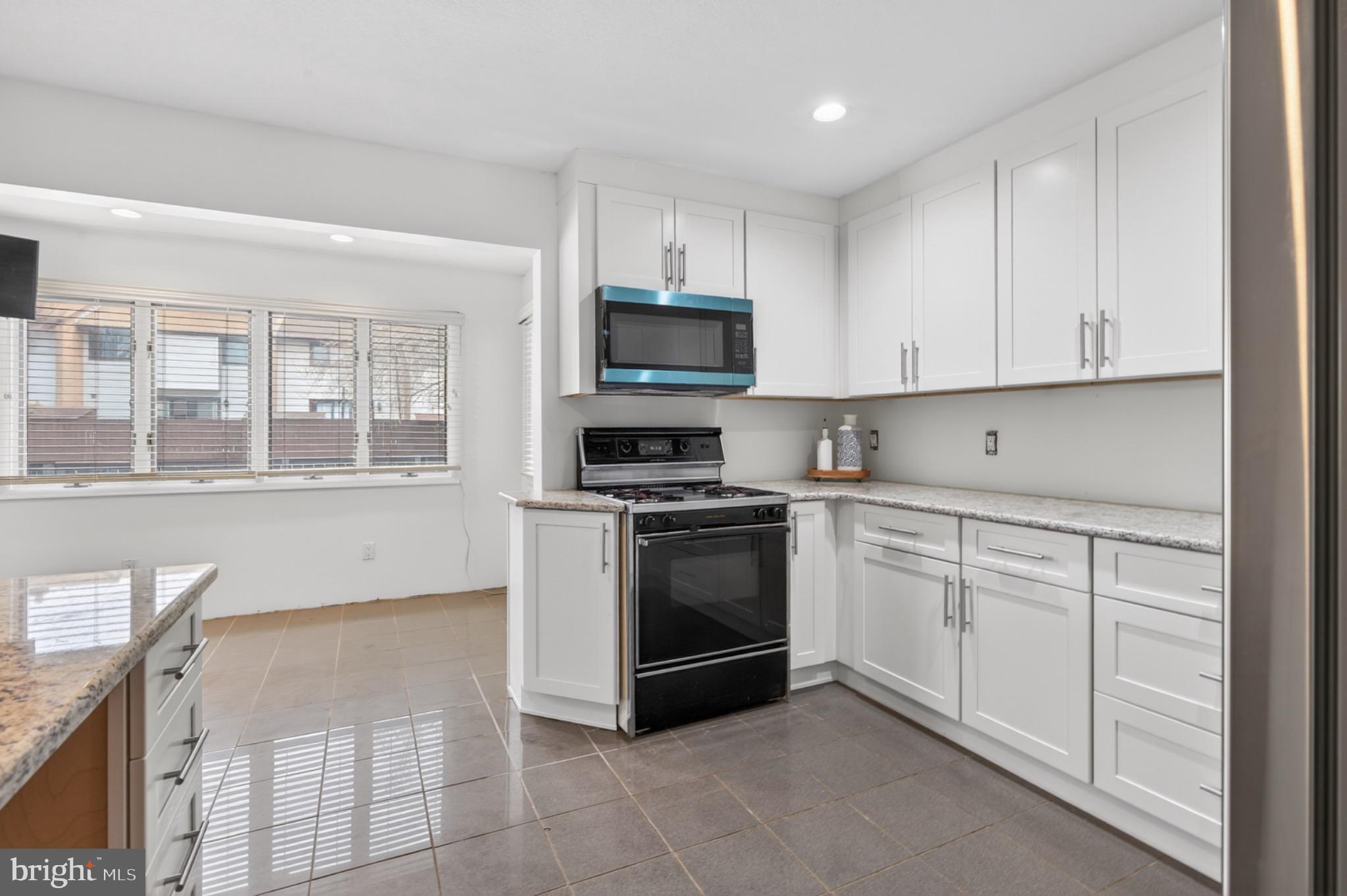 525 Fairfield Road Hightstown, NJ 08520 - Photo 10 of 31 Modern kitchen with sleek finishes.