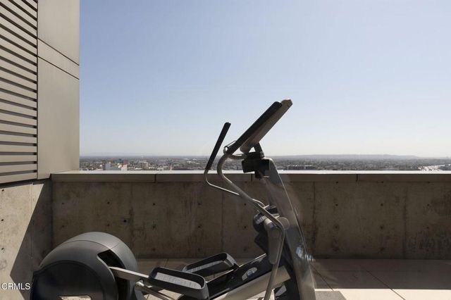 a view of a balcony with an outdoor space