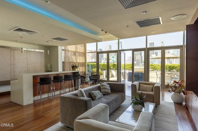 a view of a terrace with sitting area