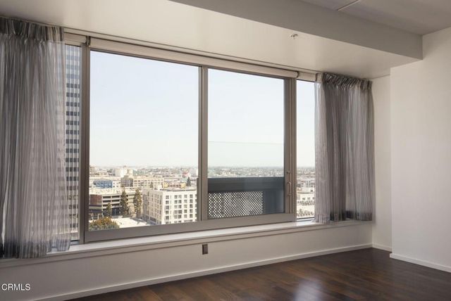 a view of city with ocean