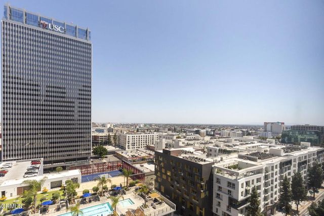 a kitchen with a sink and a stove