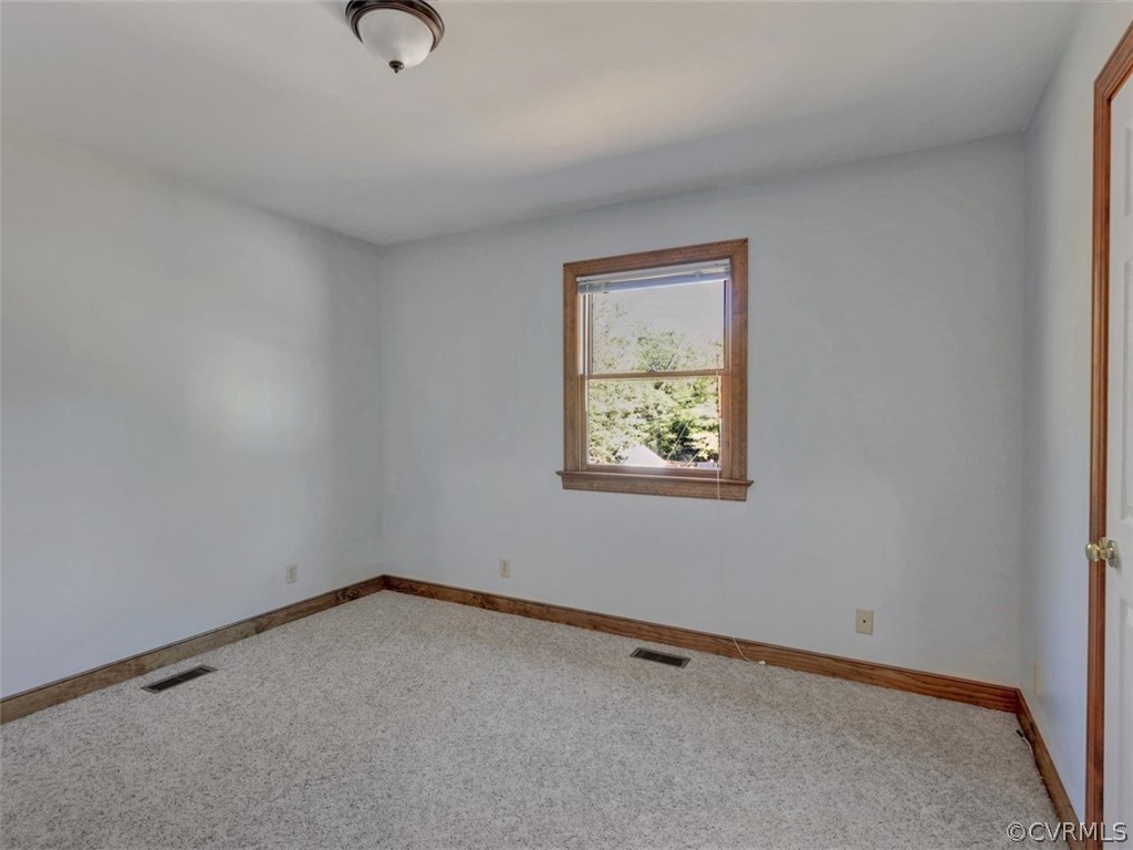 7936 Concho Road North Chesterfield, VA 23237 - Photo 17 of 24 an empty room with a window