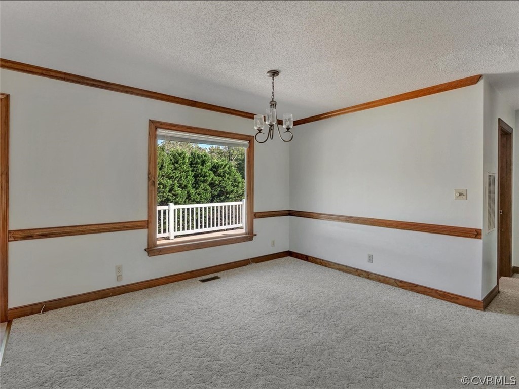 7936 Concho Road North Chesterfield, VA 23237 - Photo 8 of 24 a view of an empty room with a window