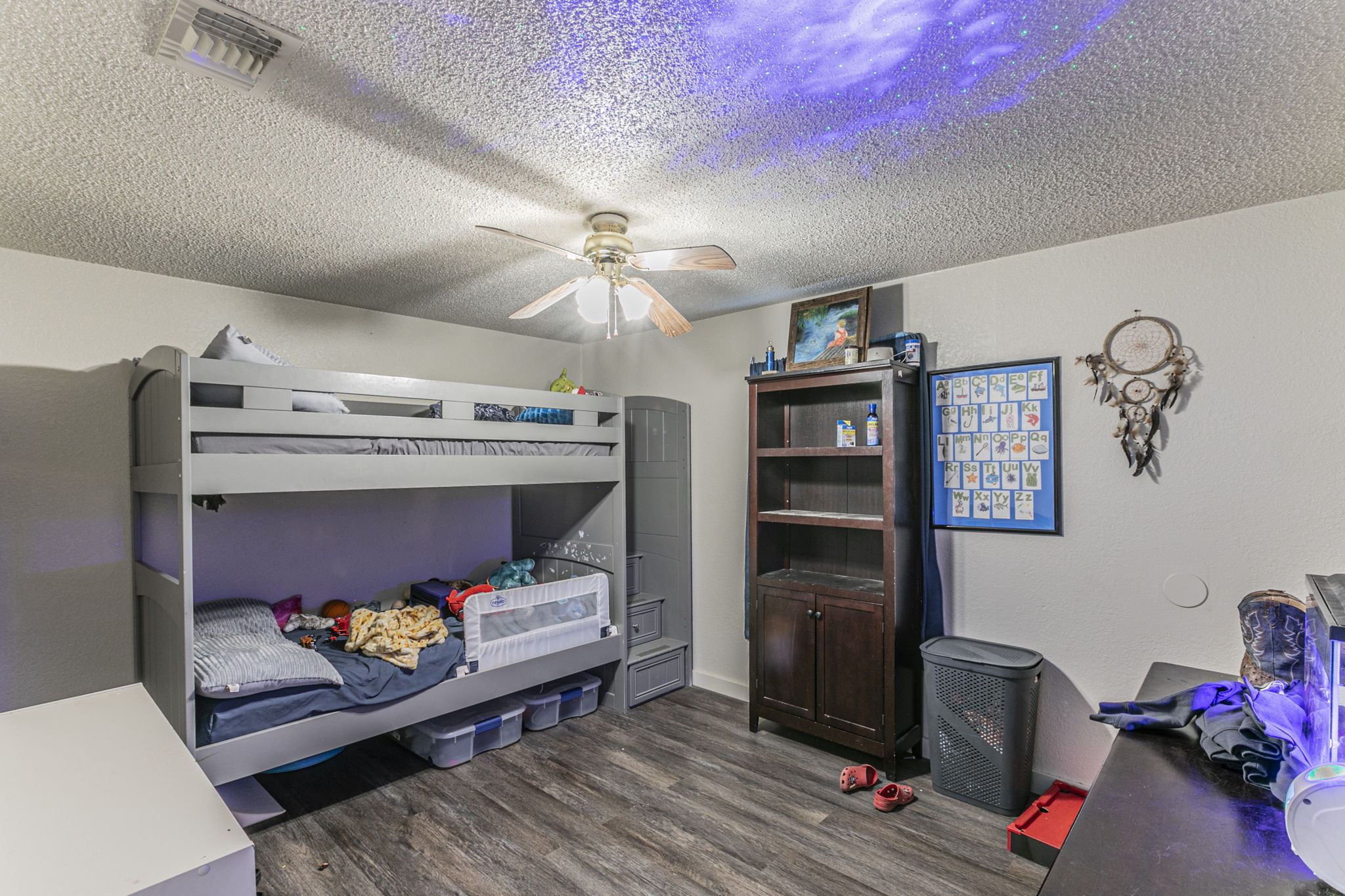 1767 Dowdy Road Seguin, TX 78155 - Photo 17 of 25 a bedroom with furniture and a bed