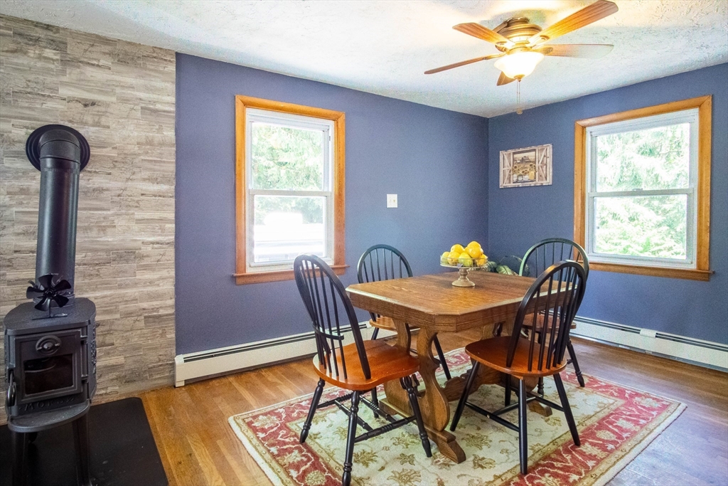 56 Chace Road East Freetown, MA 02717 - Photo 12 of 39 a view of a dining room with furniture window and wooden floor