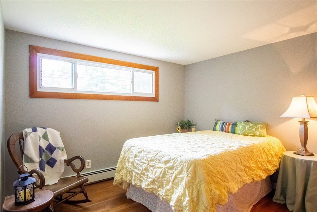 56 Chace Road East Freetown, MA 02717 - Photo 23 of 39 a bedroom with a bed and a window