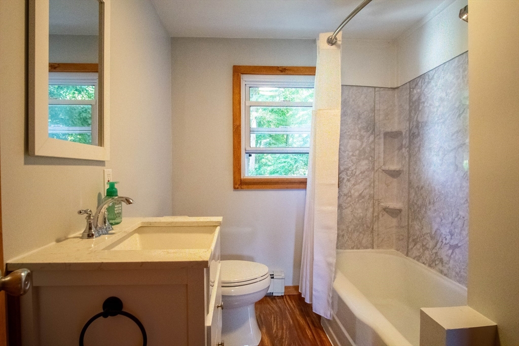 56 Chace Road East Freetown, MA 02717 - Photo 25 of 39 a bathroom with a sink toilet and shower