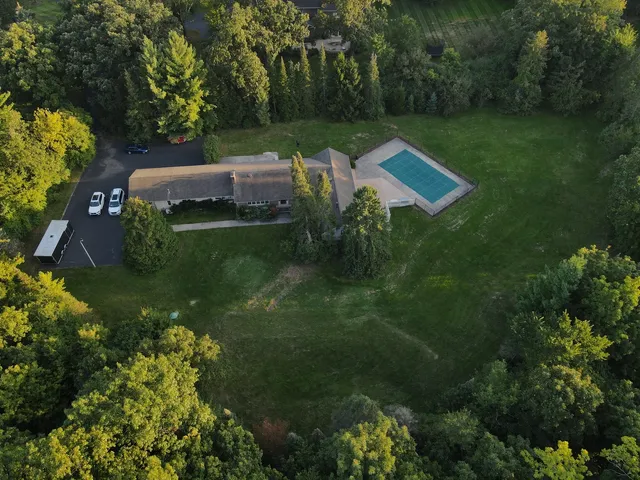 a backyard of a house with lots of green space