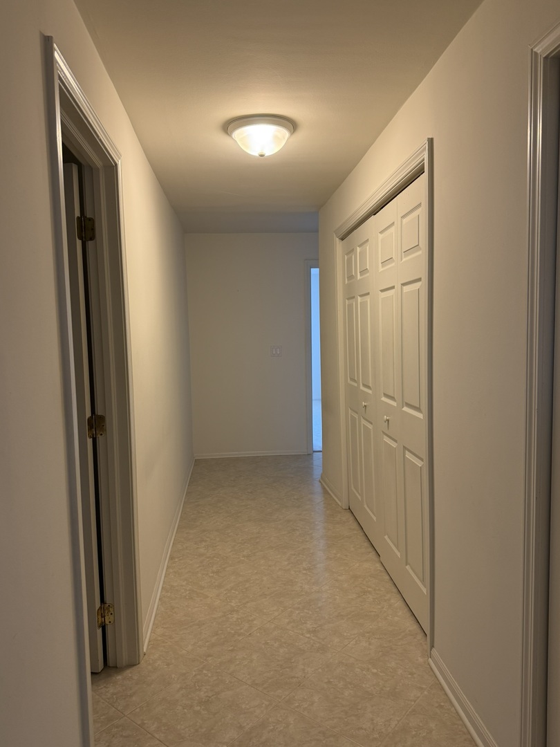 1842 Thomas Atkinson Road Inverness, IL 60067 - Photo 4 of 14 an empty room with windows