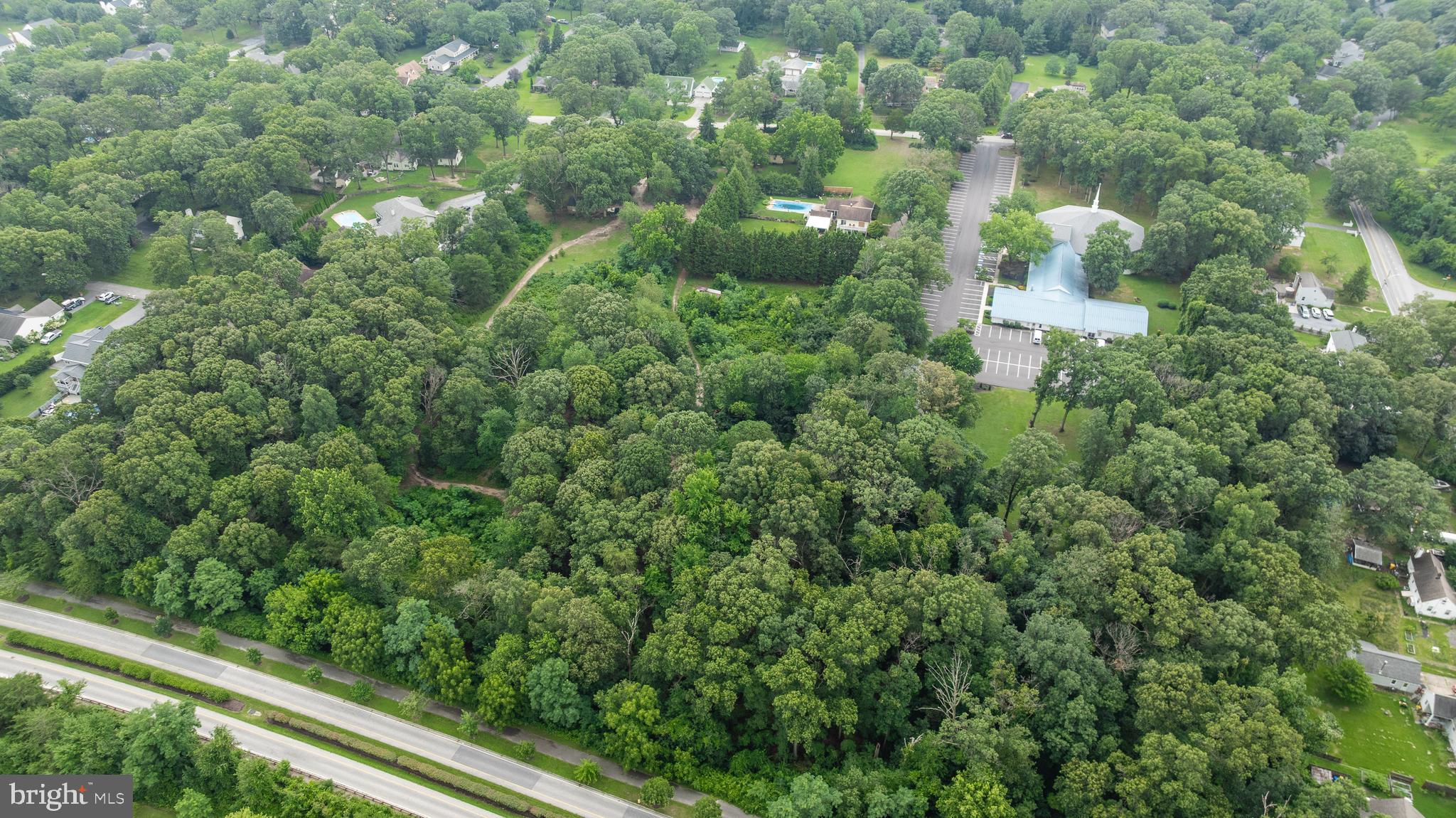 304 West Pasadena Road Millersville, MD 21108 - Photo 2 of 7 view of a city with lush green forest