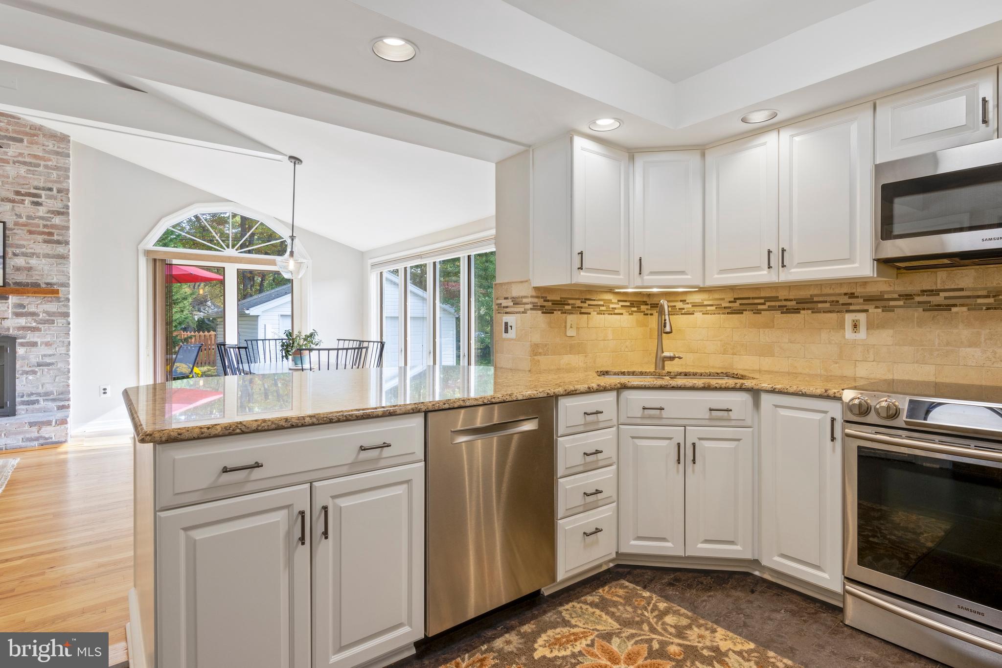 402 Briarwood Road Wallingford, PA 19086 - Photo 16 of 25 Kitchen open to family room