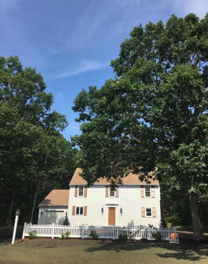 52 Spring Hill Road North Chatham, MA 02650 - Photo 4 of 33 a white house with a tree in the background