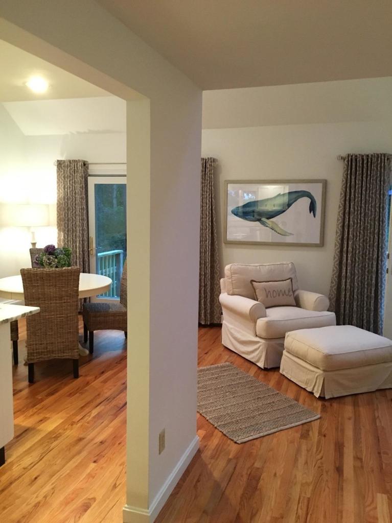 52 Spring Hill Road North Chatham, MA 02650 - Photo 6 of 33 a living room with furniture and a wooden floor