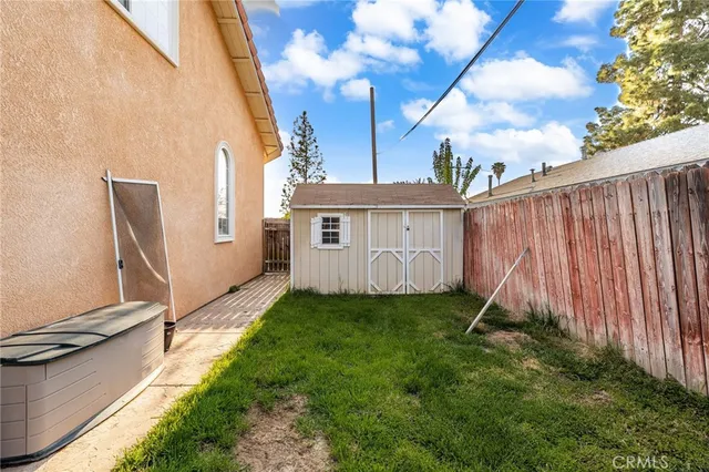 a view of a backyard with a garden