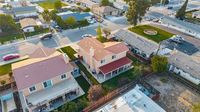 an aerial view of a house with a garden