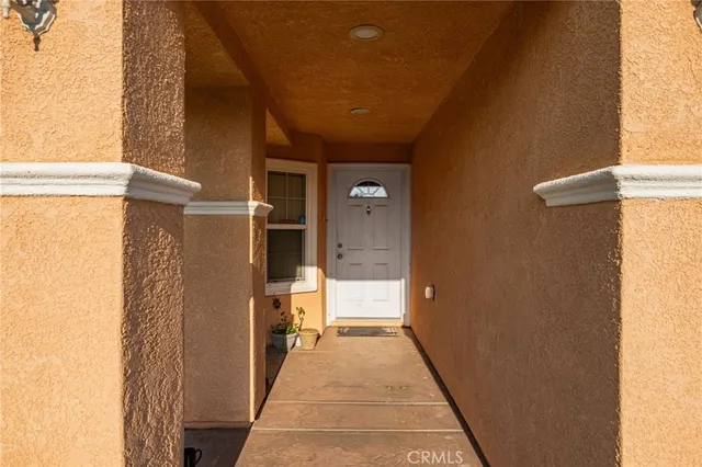 a bathroom with a glass door shower