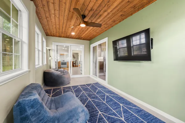 a living room with furniture and a window