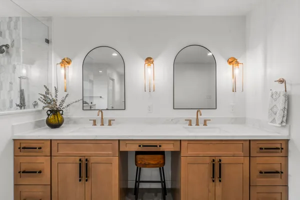 a close view of sink and a mirror