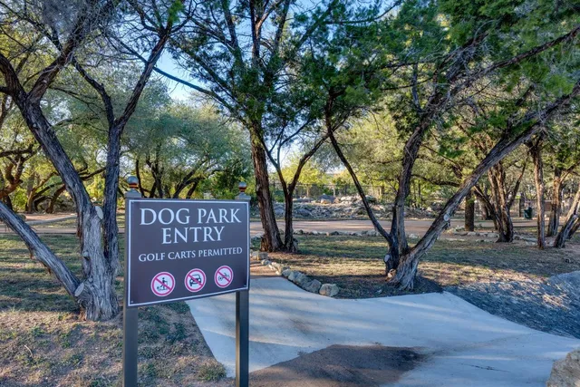 a view of backyard with green space