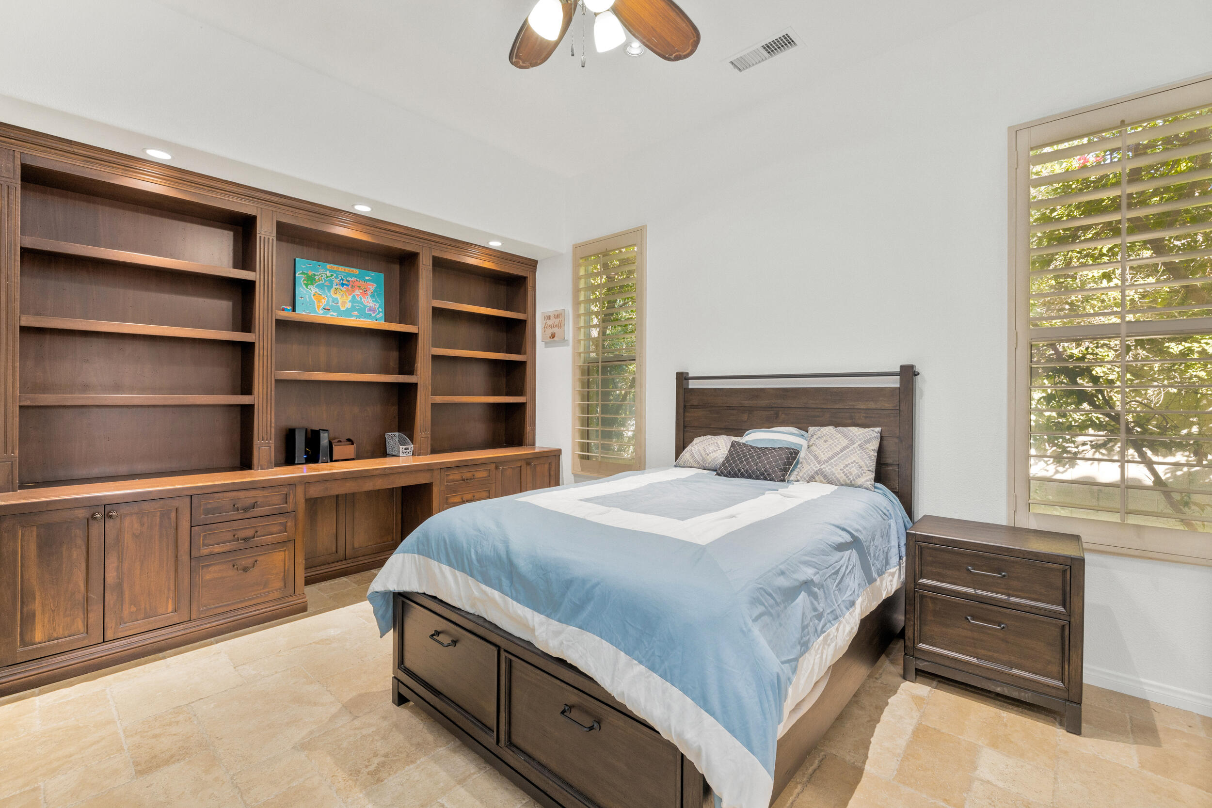 8 Trafalgar Rancho Mirage, CA 92270 - Photo 12 of 41 a bedroom with a bed and a window