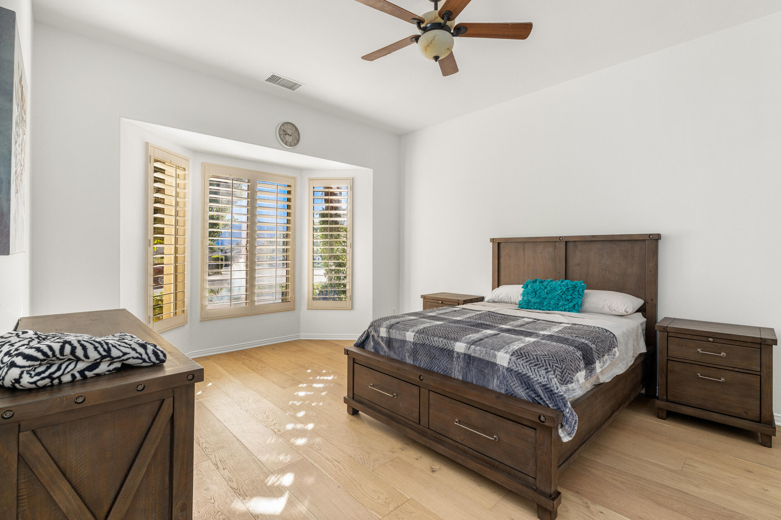 8 Trafalgar Rancho Mirage, CA 92270 - Photo 13 of 41 a bedroom with a bed and a window