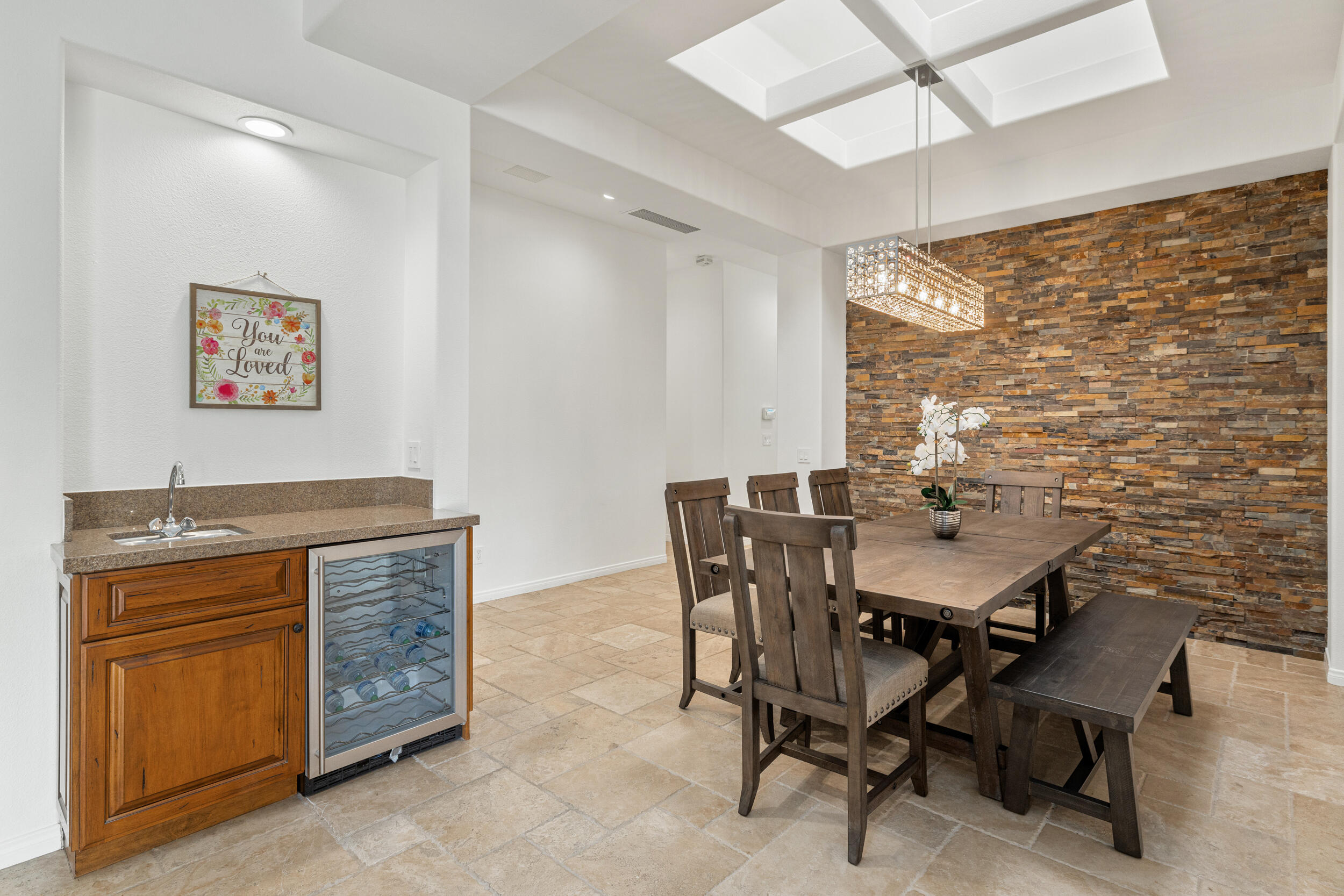 8 Trafalgar Rancho Mirage, CA 92270 - Photo 4 of 41 a view of a dining room with furniture and chandelier