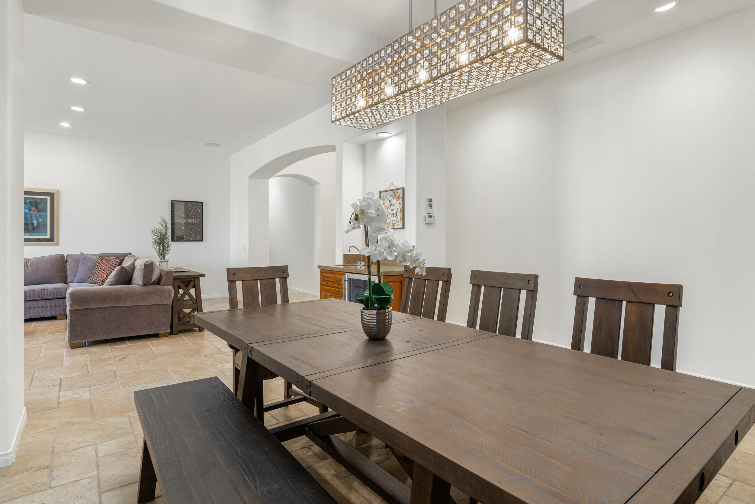 8 Trafalgar Rancho Mirage, CA 92270 - Photo 5 of 41 a view of a dining room with furniture and wooden floor