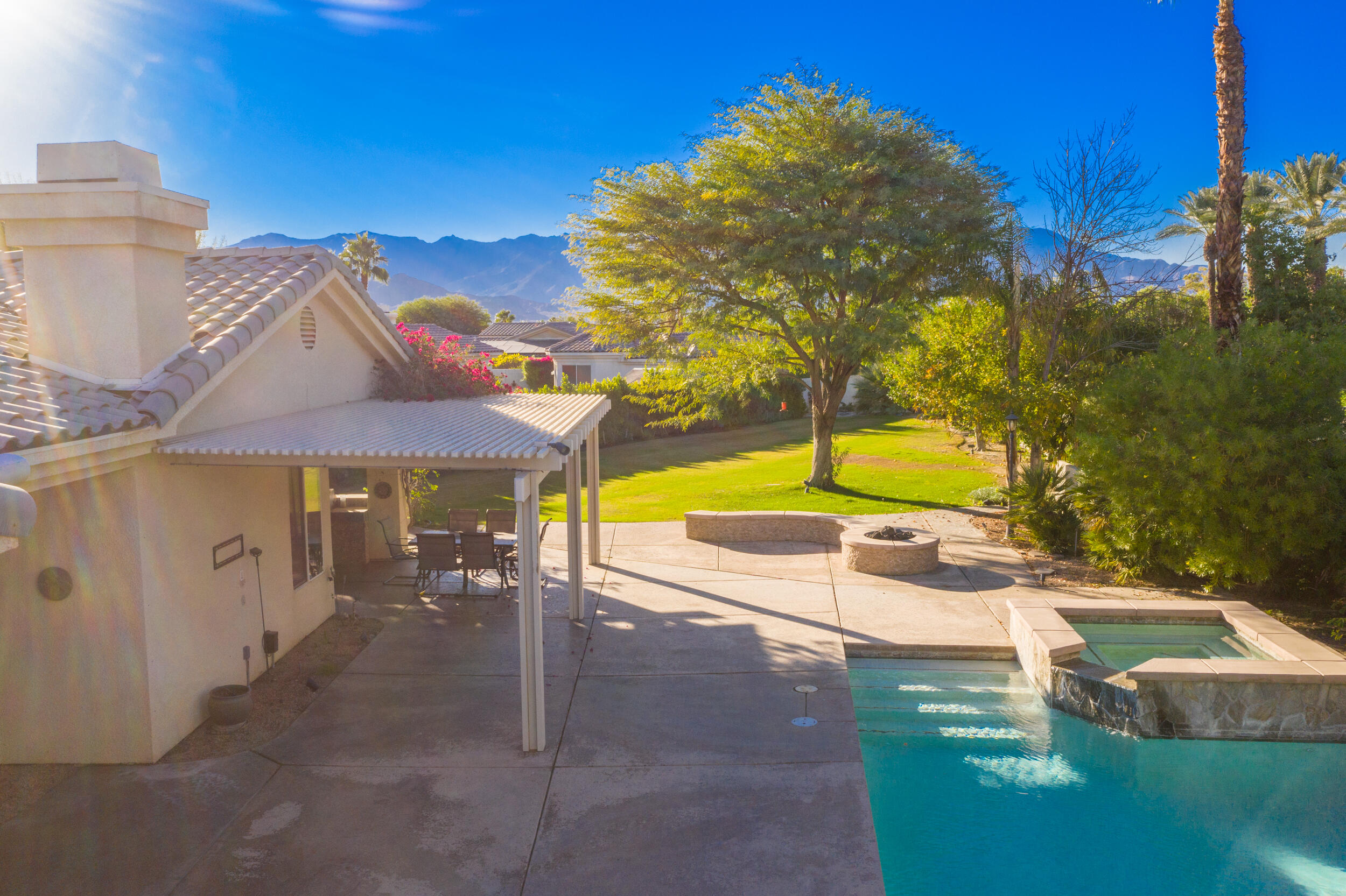 8 Trafalgar Rancho Mirage, CA 92270 - Photo 7 of 41 a view of a house with a yard
