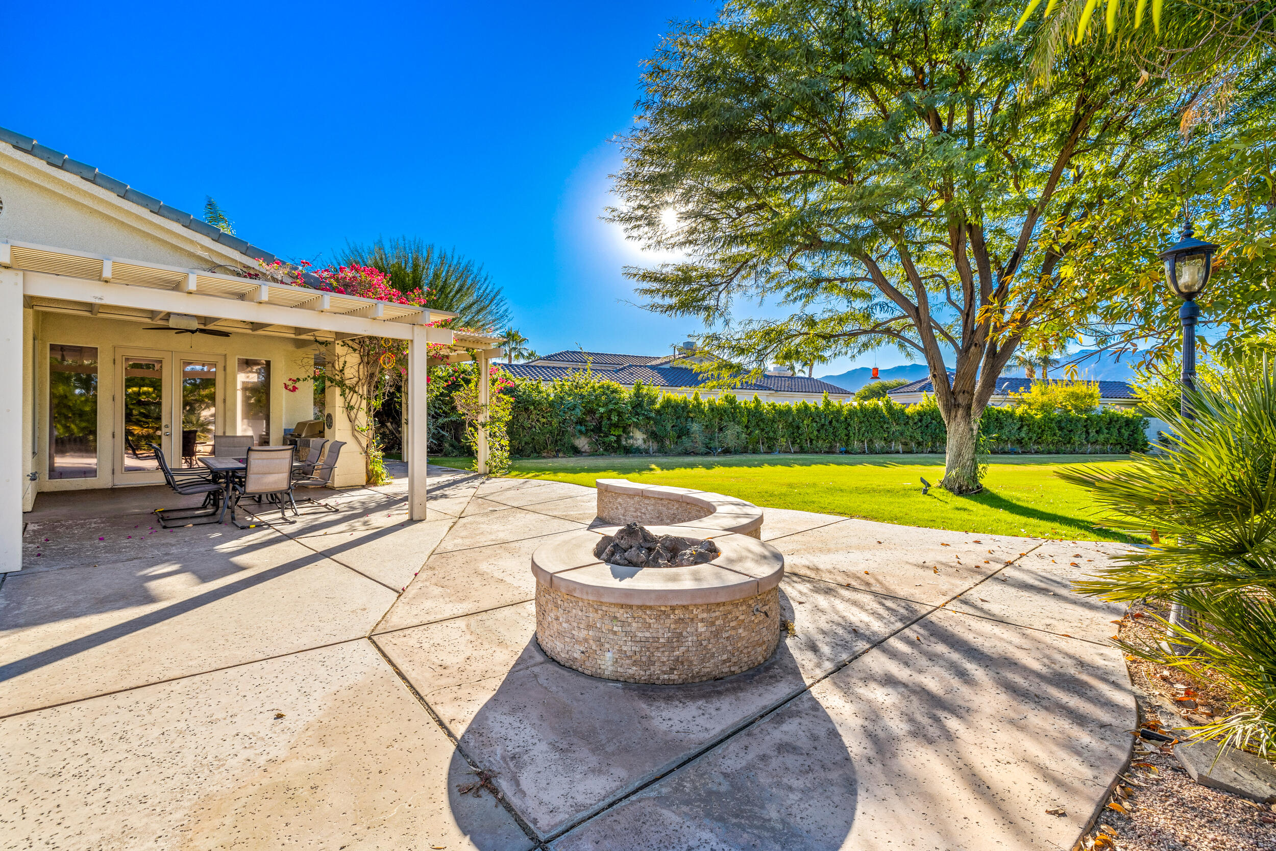 8 Trafalgar Rancho Mirage, CA 92270 - Photo 9 of 41 a view of a swimming pool and outdoor space