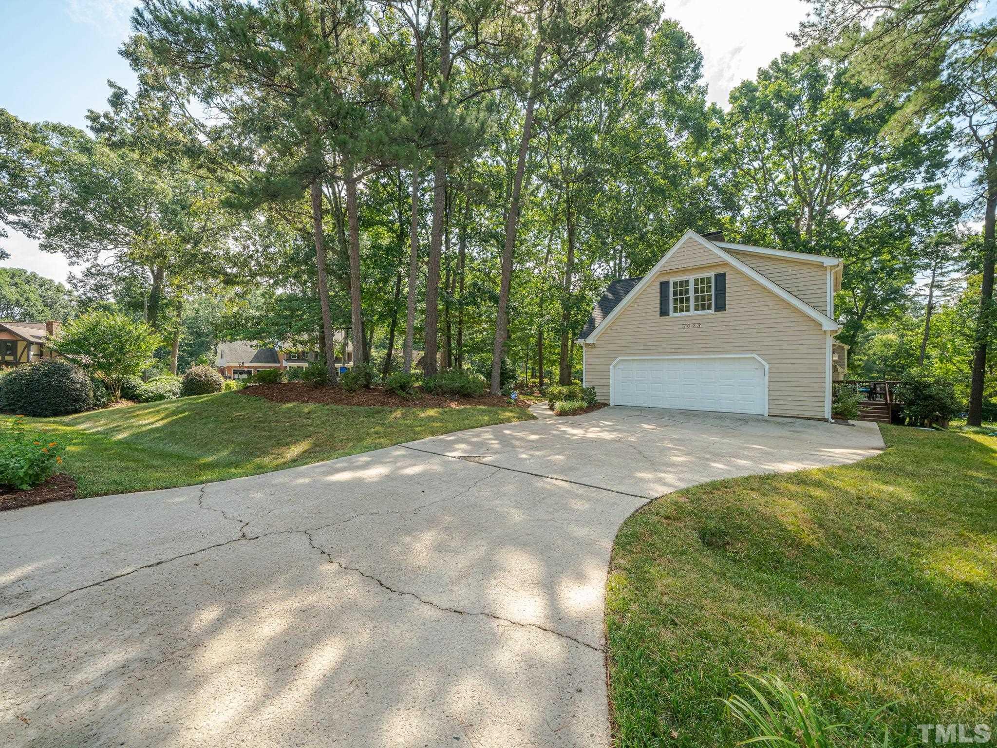 5029 Trail Ridge Drive Raleigh, NC 27613 - Photo 37 of 37 a view of a house with a yard