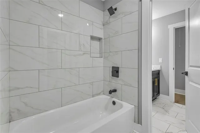 a bathroom with a bathtub