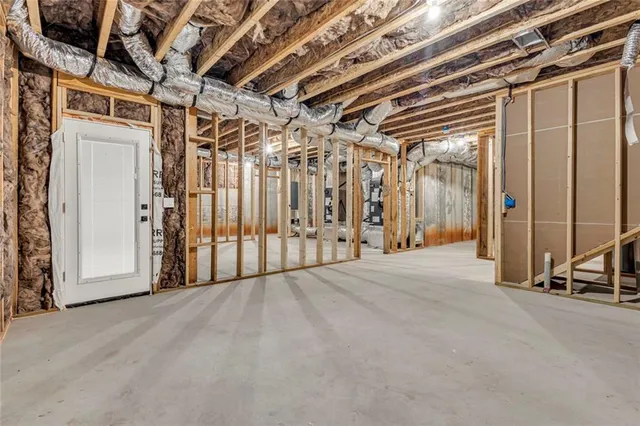 a view of a room with wooden walls