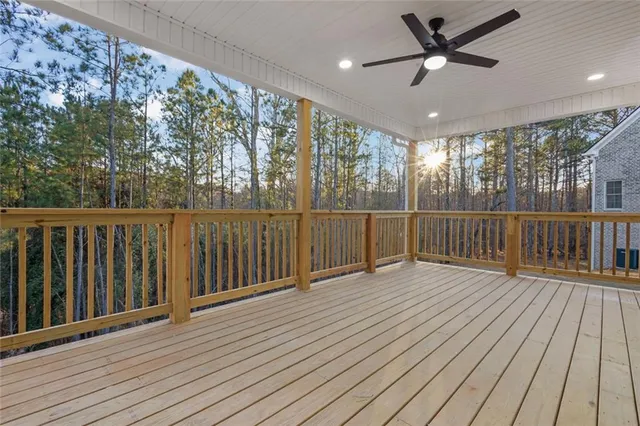 a view of wooden balcony with wooden floor