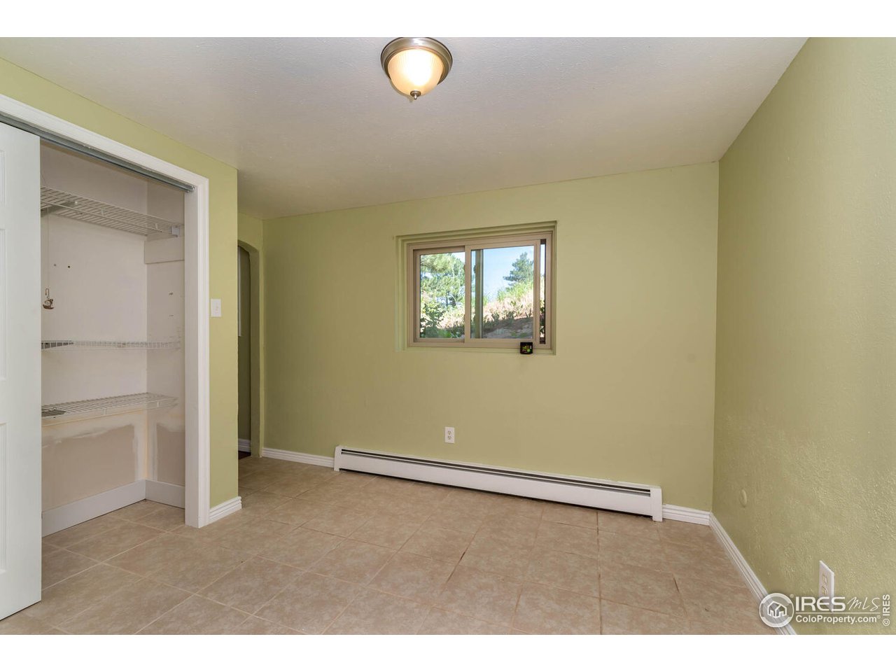 6778 Olde Stage Road Boulder, CO 80302 - Photo 21 of 40 Main level bedroom