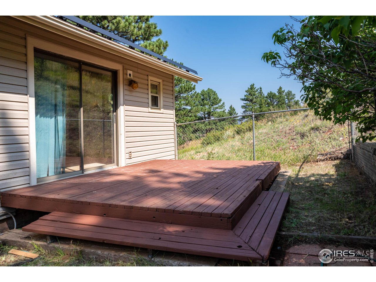 6778 Olde Stage Road Boulder, CO 80302 - Photo 26 of 40 Private deck off upper secondary bedroom