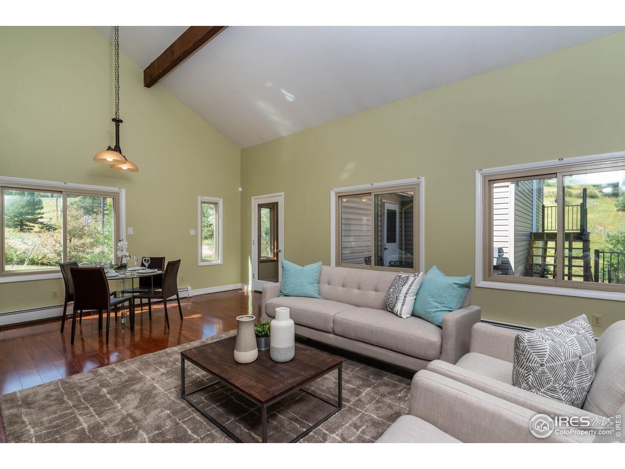 6778 Olde Stage Road Boulder, CO 80302 - Photo 9 of 40 Vaulted living room toward dining