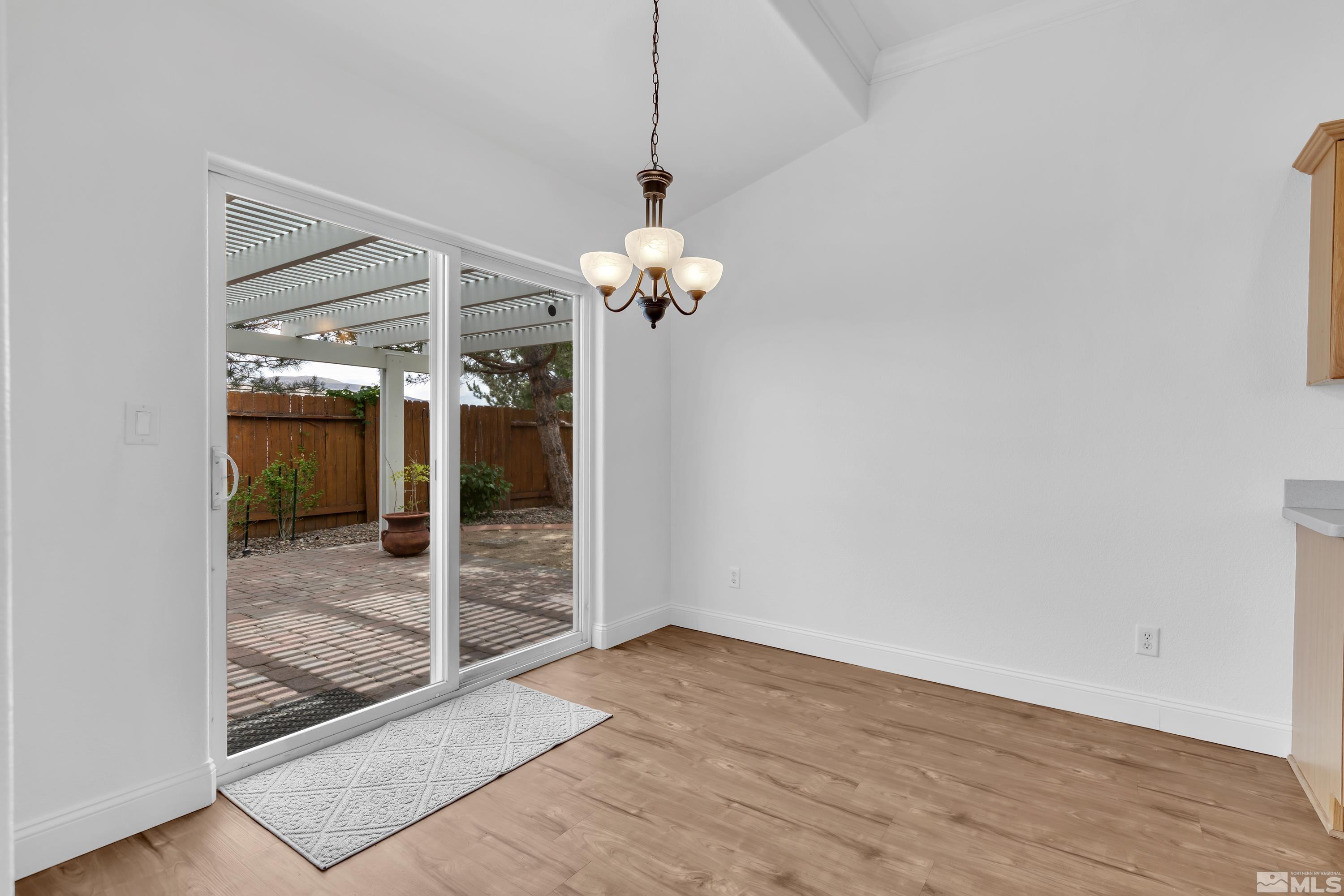 10445 Arbor Way Reno, NV 89521 - Photo 15 of 39 a view of a room with wooden floor