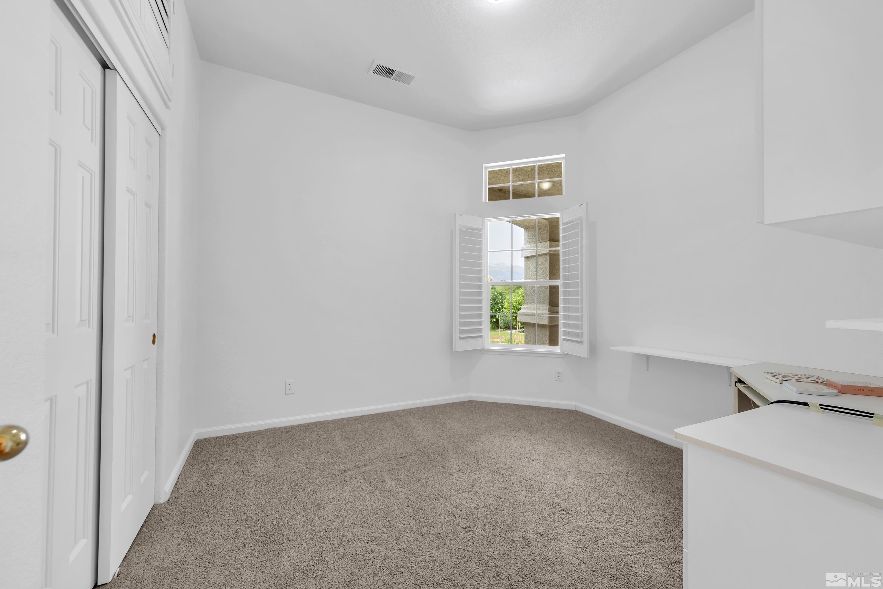 10445 Arbor Way Reno, NV 89521 - Photo 27 of 39 a view of a room that has a window in it