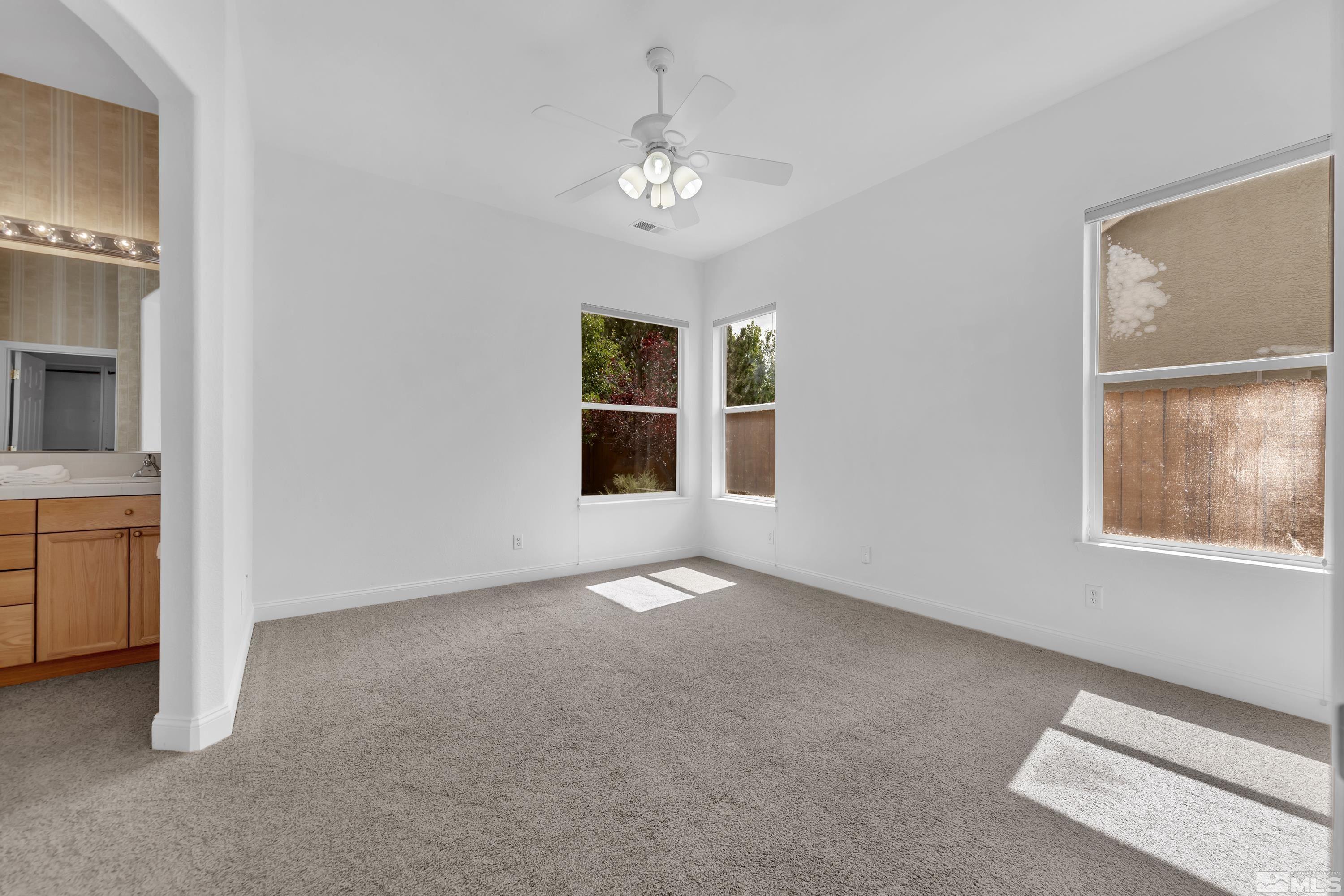 10445 Arbor Way Reno, NV 89521 - Photo 29 of 39 a view of an empty room with a window