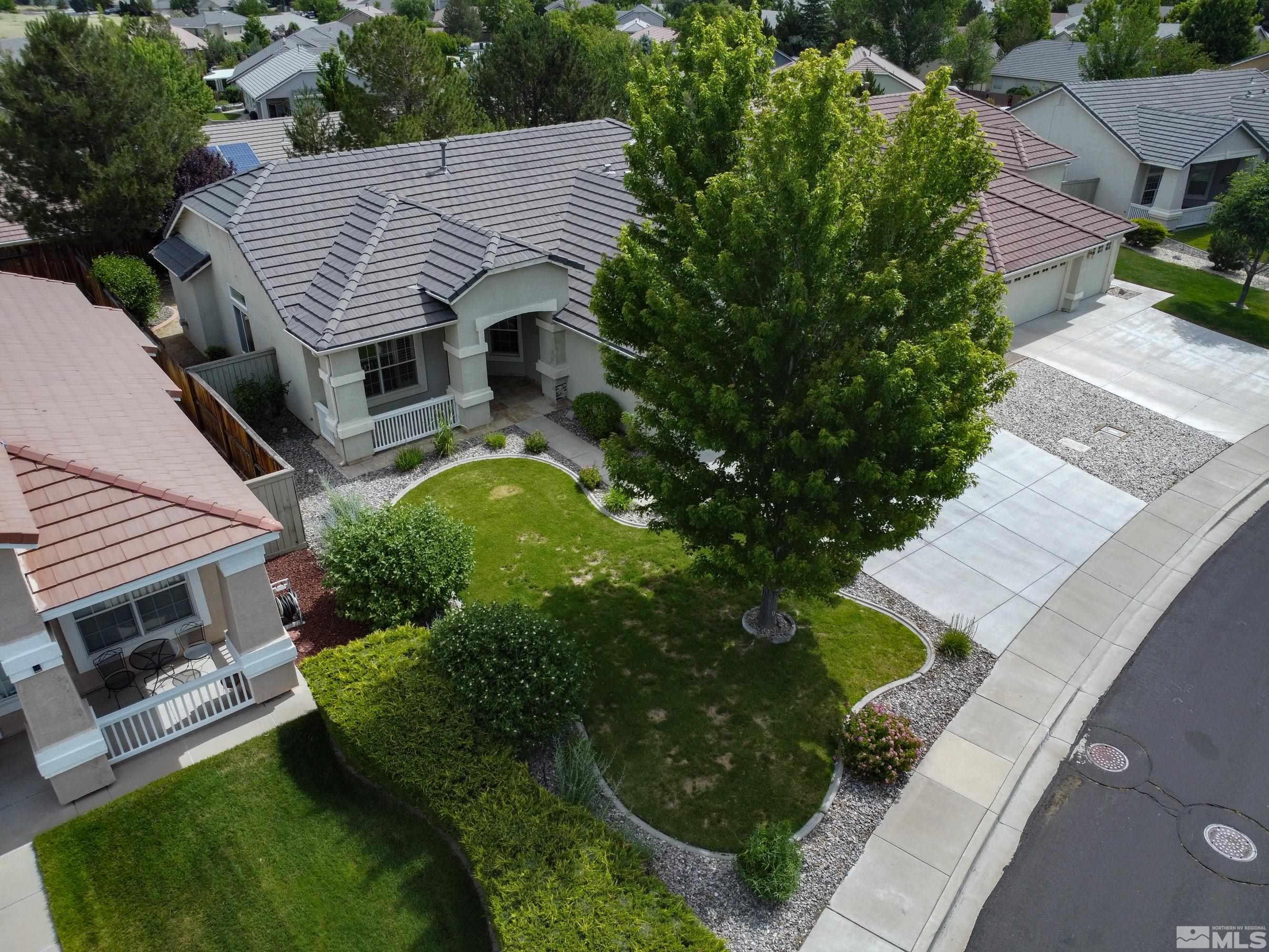 10445 Arbor Way Reno, NV 89521 - Photo 35 of 39 an aerial view of a house with a yard