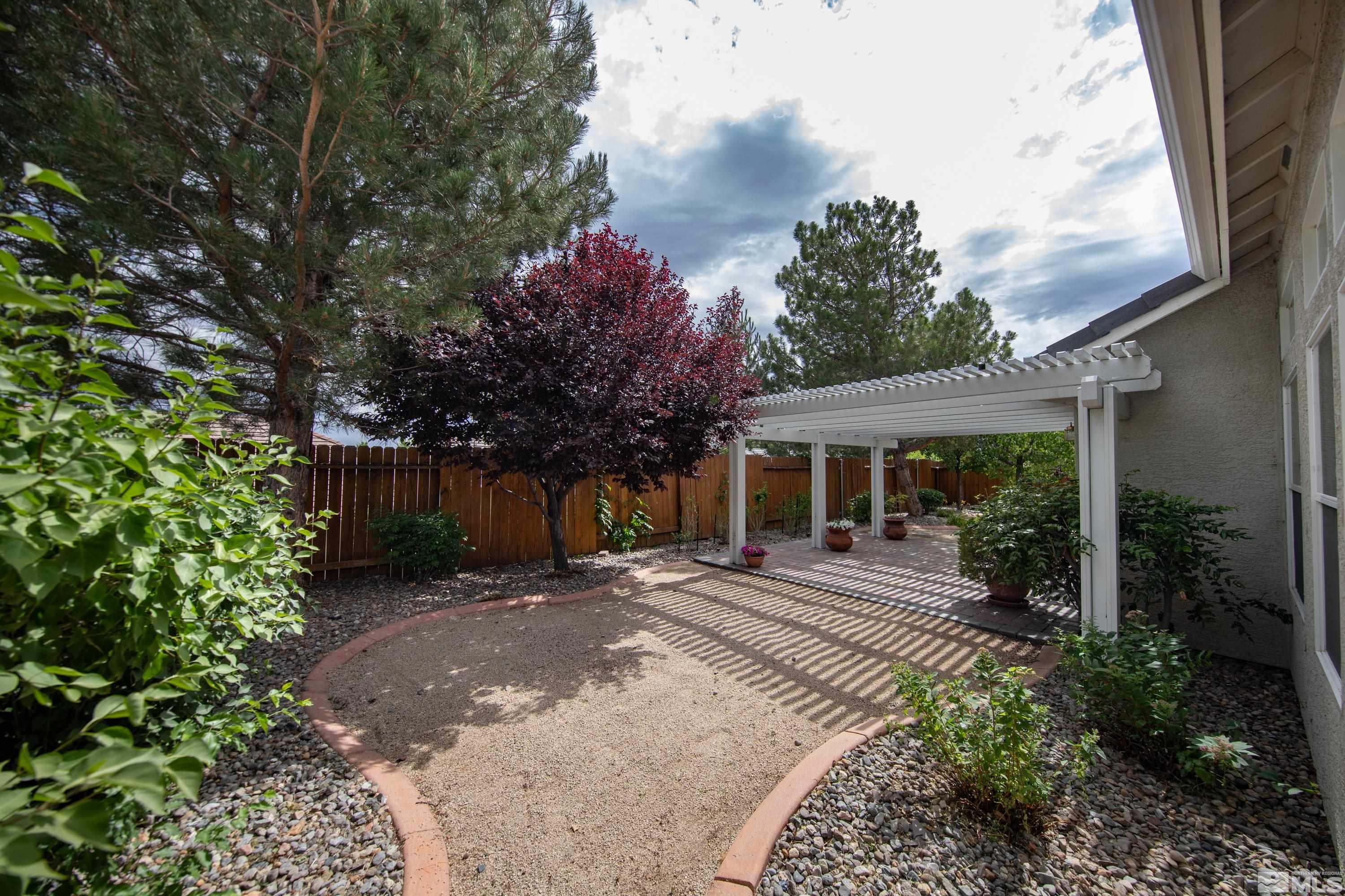 10445 Arbor Way Reno, NV 89521 - Photo 37 of 39 a front view of a house with a yard